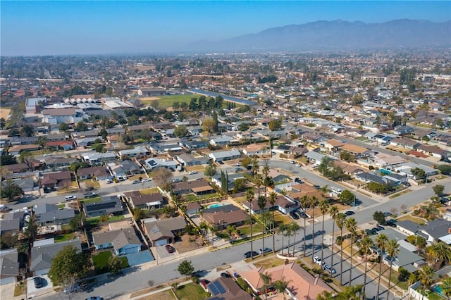 drone / aerial view featuring a mountain view