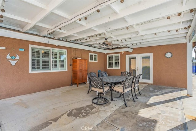 view of patio / terrace with ceiling fan and french doors