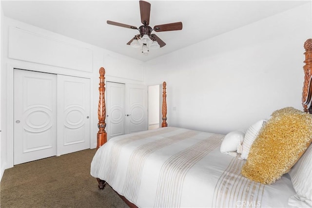 bedroom with ceiling fan and dark carpet