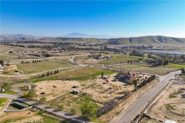 aerial view with a mountain view and a rural view