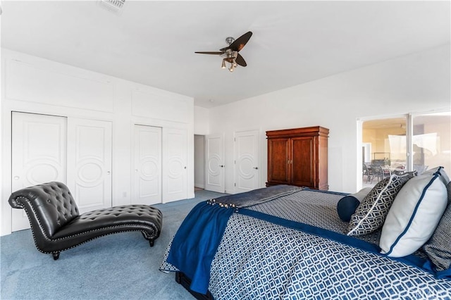 bedroom featuring ceiling fan and carpet