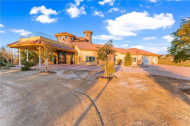 view of front of property featuring a garage