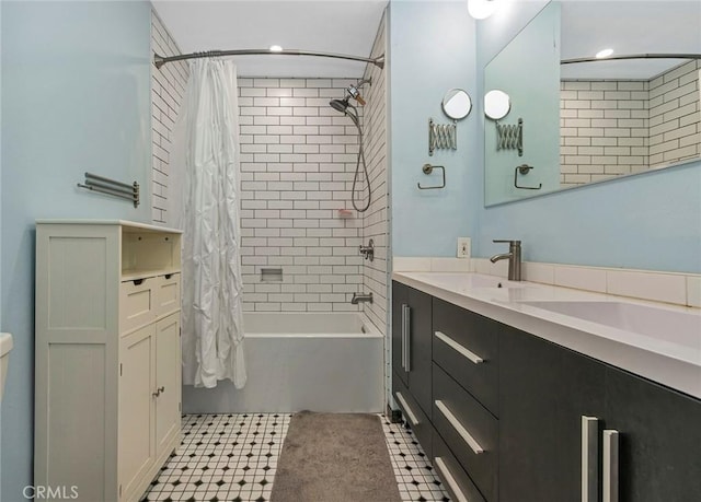 bathroom with shower / bath combo and vanity