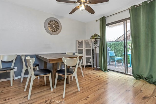 dining space featuring light hardwood / wood-style floors and ceiling fan