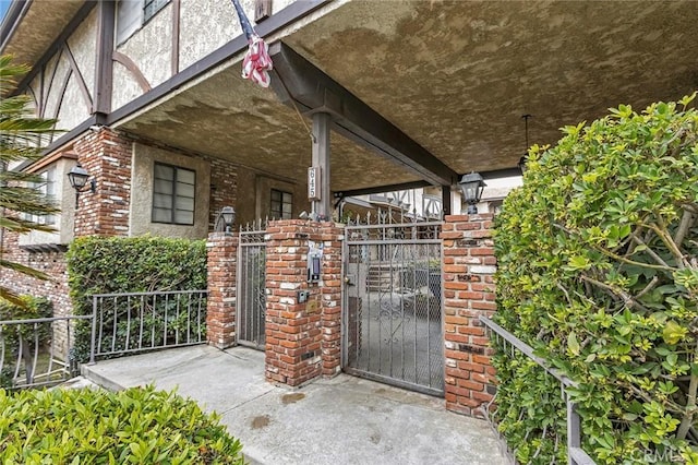 view of gate featuring a porch