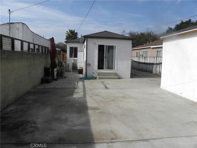 rear view of house featuring a patio area