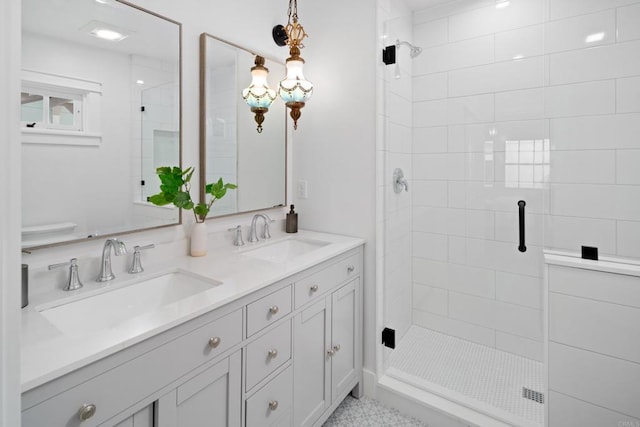 bathroom with vanity and walk in shower