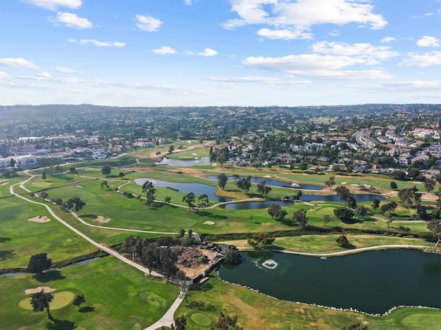 birds eye view of property featuring a water view and golf course view