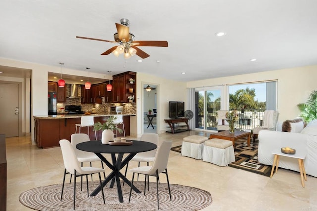 dining room featuring a ceiling fan and recessed lighting