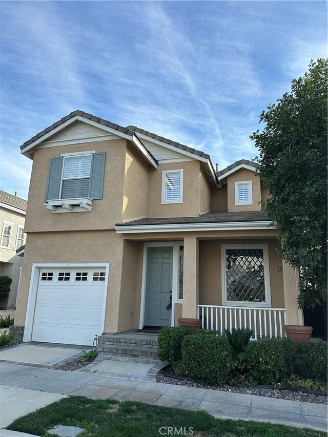 view of front of property featuring a garage