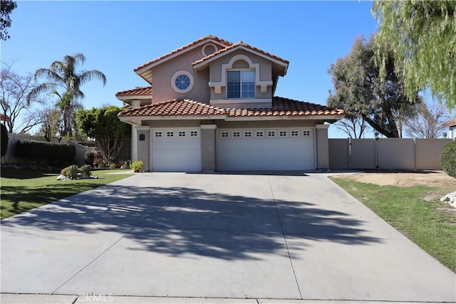 mediterranean / spanish-style home with a garage