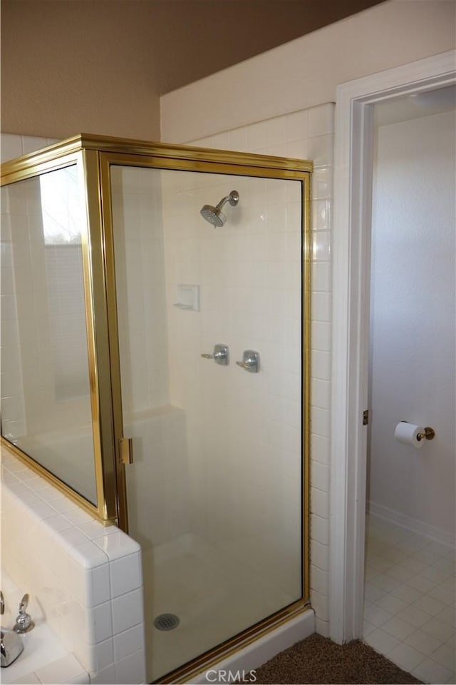 bathroom with an enclosed shower