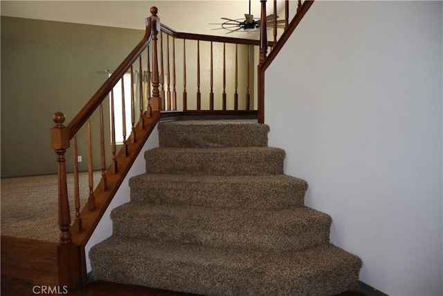 stairs with ceiling fan