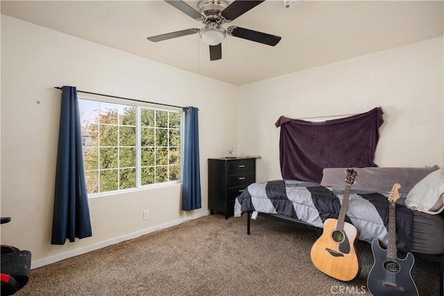 bedroom with ceiling fan and carpet floors