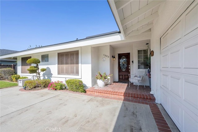 entrance to property with a garage