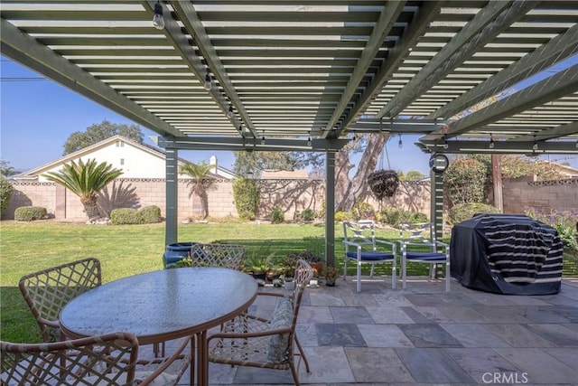 view of patio featuring area for grilling and a pergola