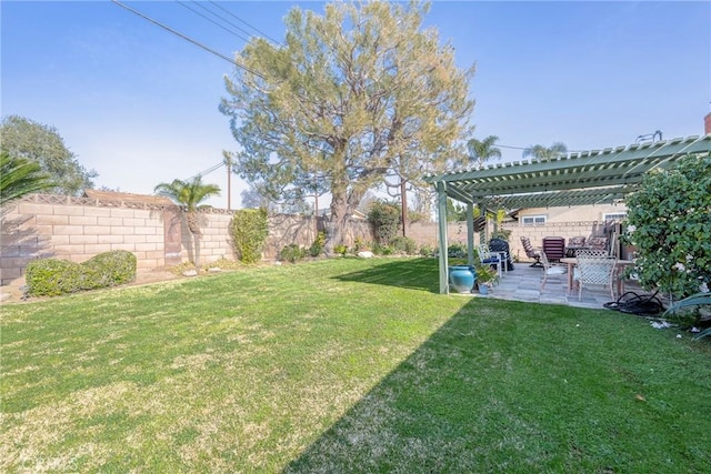 view of yard with a pergola and a patio