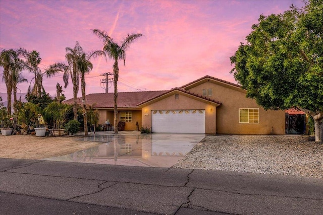 view of front of house with a garage