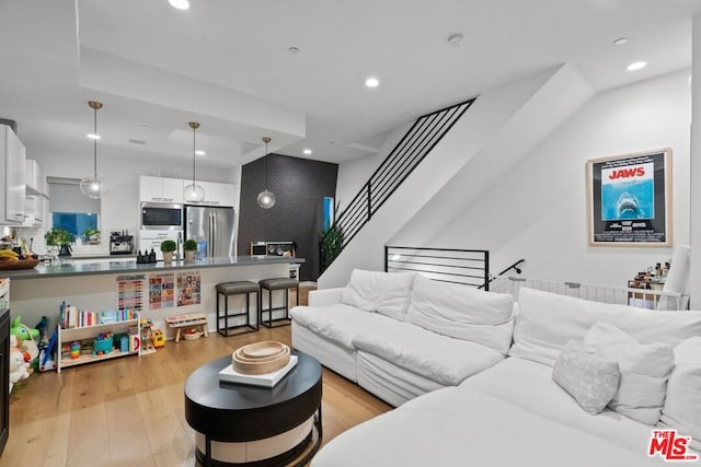 living room featuring light wood-type flooring