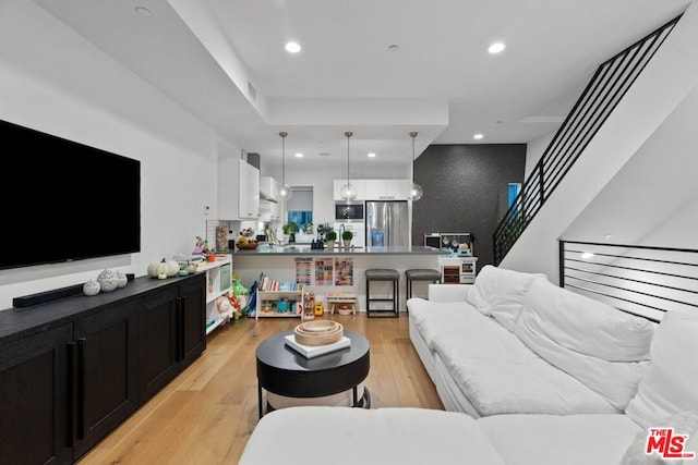 living room featuring light wood-type flooring