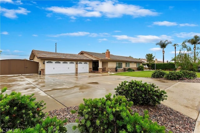 ranch-style home with a garage