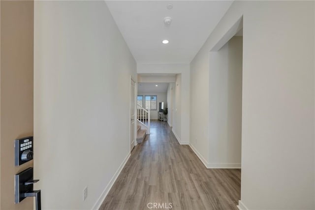 hallway featuring light wood-type flooring