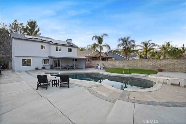 view of pool with a patio