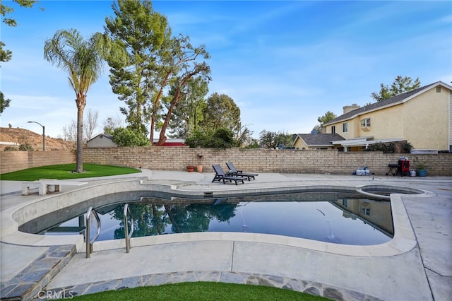 view of pool featuring a patio area