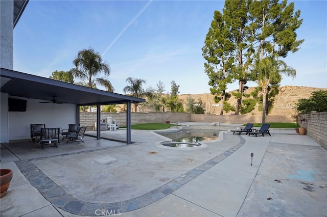 view of patio / terrace with ceiling fan