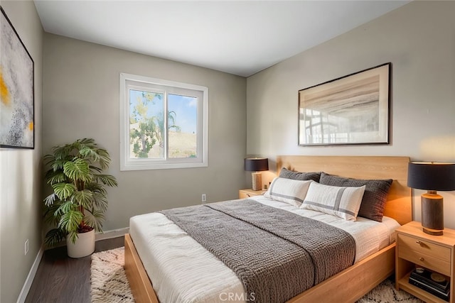 bedroom featuring wood-type flooring