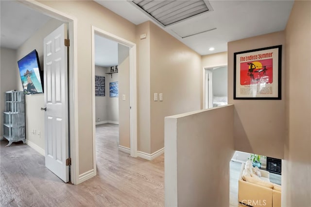 hallway featuring light hardwood / wood-style floors