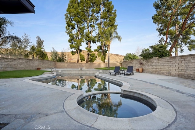 view of pool with a patio