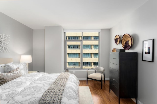 bedroom featuring wood-type flooring