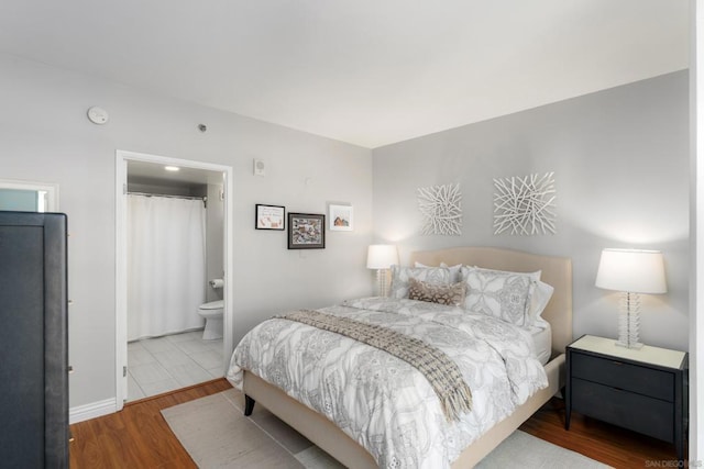 bedroom featuring hardwood / wood-style floors