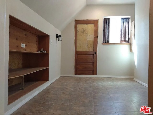 interior space featuring lofted ceiling