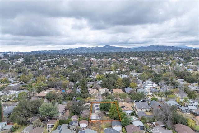 drone / aerial view featuring a mountain view