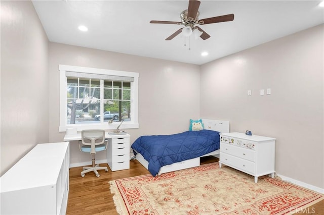 bedroom featuring ceiling fan and light wood-type flooring