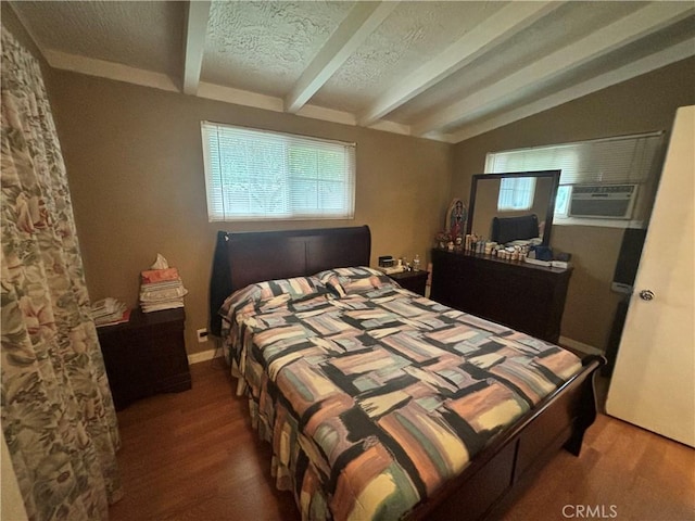 bedroom with cooling unit, vaulted ceiling with beams, wood-type flooring, and a textured ceiling