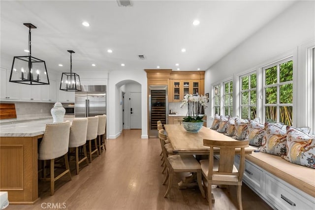 dining space featuring light hardwood / wood-style flooring