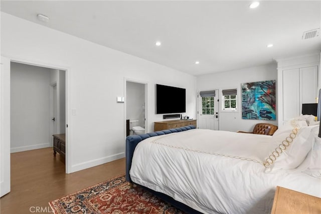 bedroom featuring dark wood-type flooring