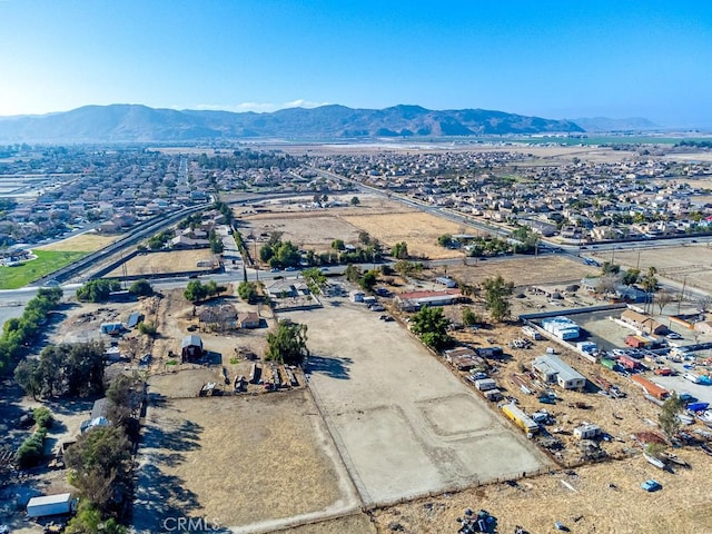 drone / aerial view featuring a mountain view