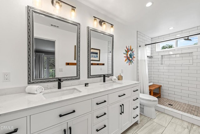 full bath with a stall shower, visible vents, a sink, and toilet