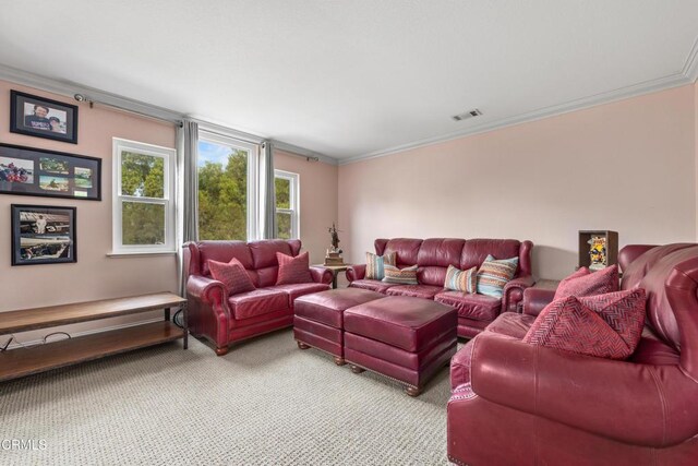 living room with light carpet, visible vents, and crown molding