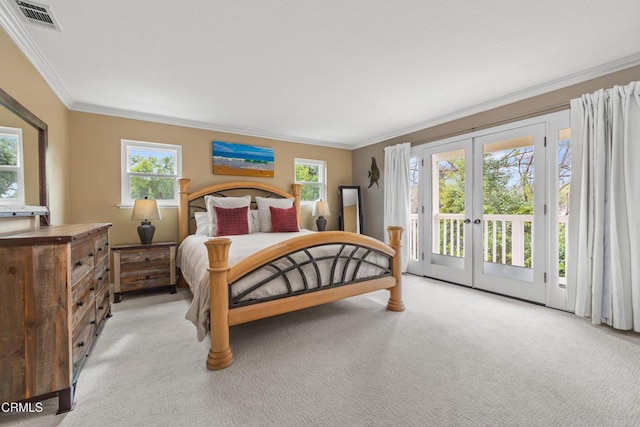 bedroom with light carpet, visible vents, access to outside, crown molding, and french doors