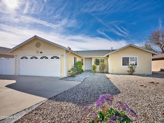 ranch-style home with a garage