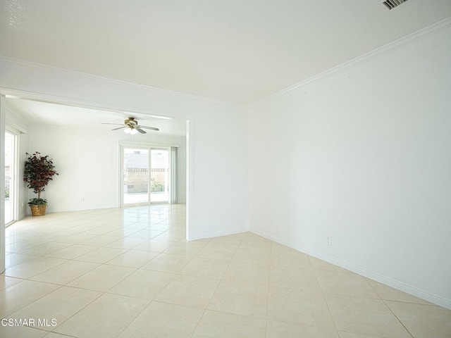 tiled empty room with ornamental molding and ceiling fan