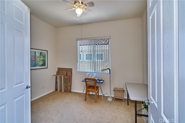 miscellaneous room with light colored carpet and ceiling fan