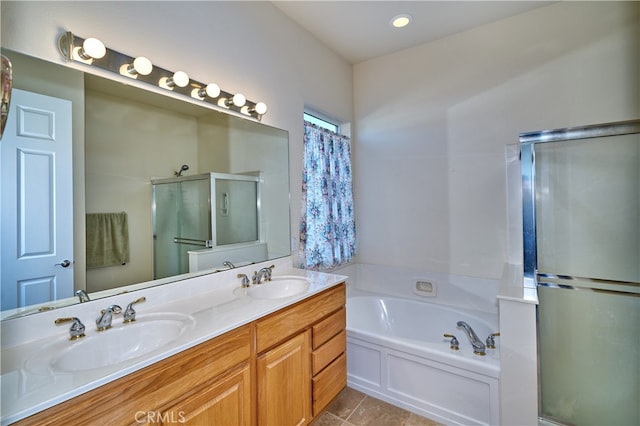 bathroom featuring vanity, tile patterned flooring, and independent shower and bath