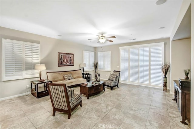 living room with ceiling fan