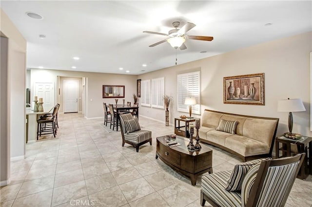 living room featuring ceiling fan